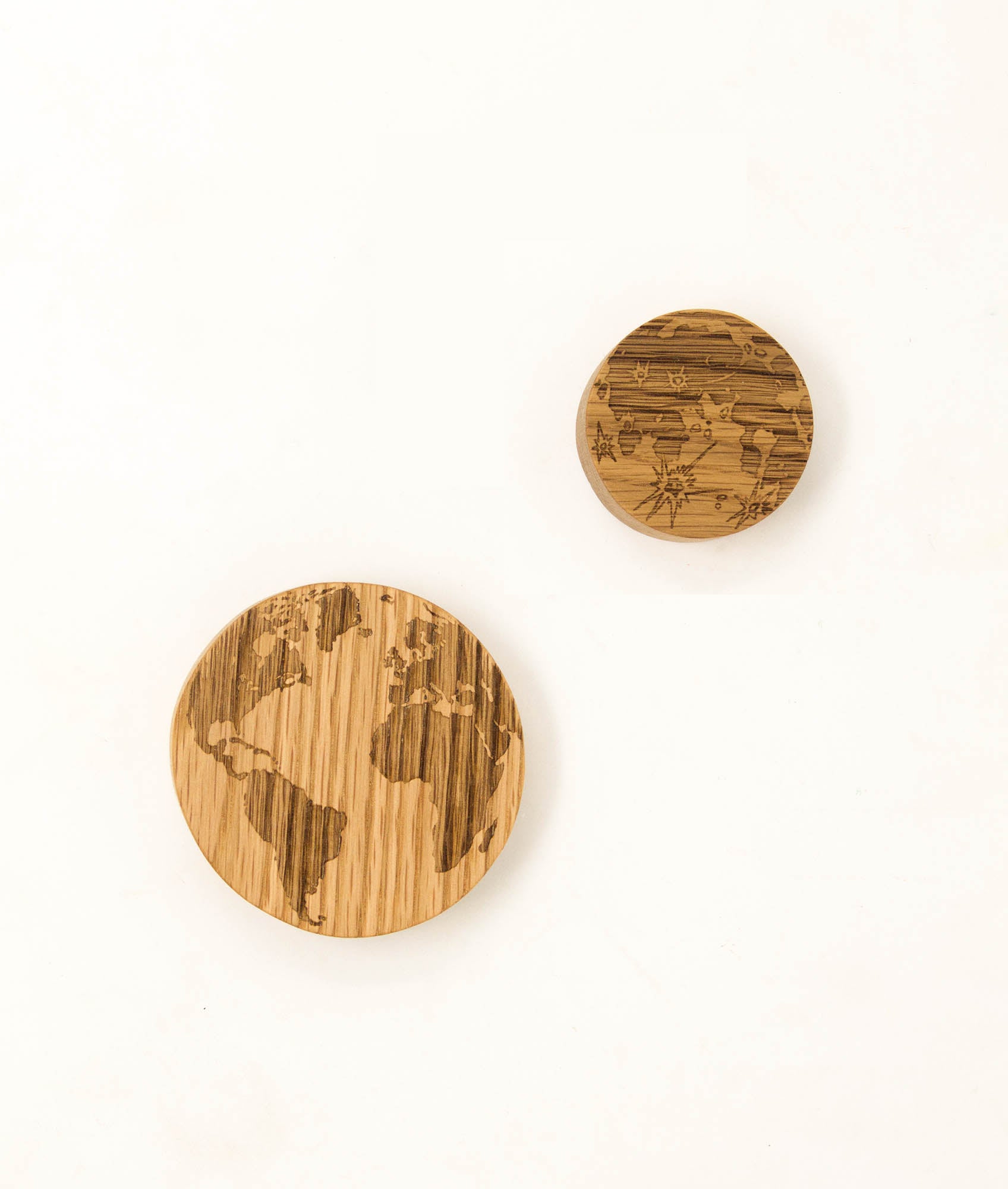 Wooden oak lasered moon and earth toys.